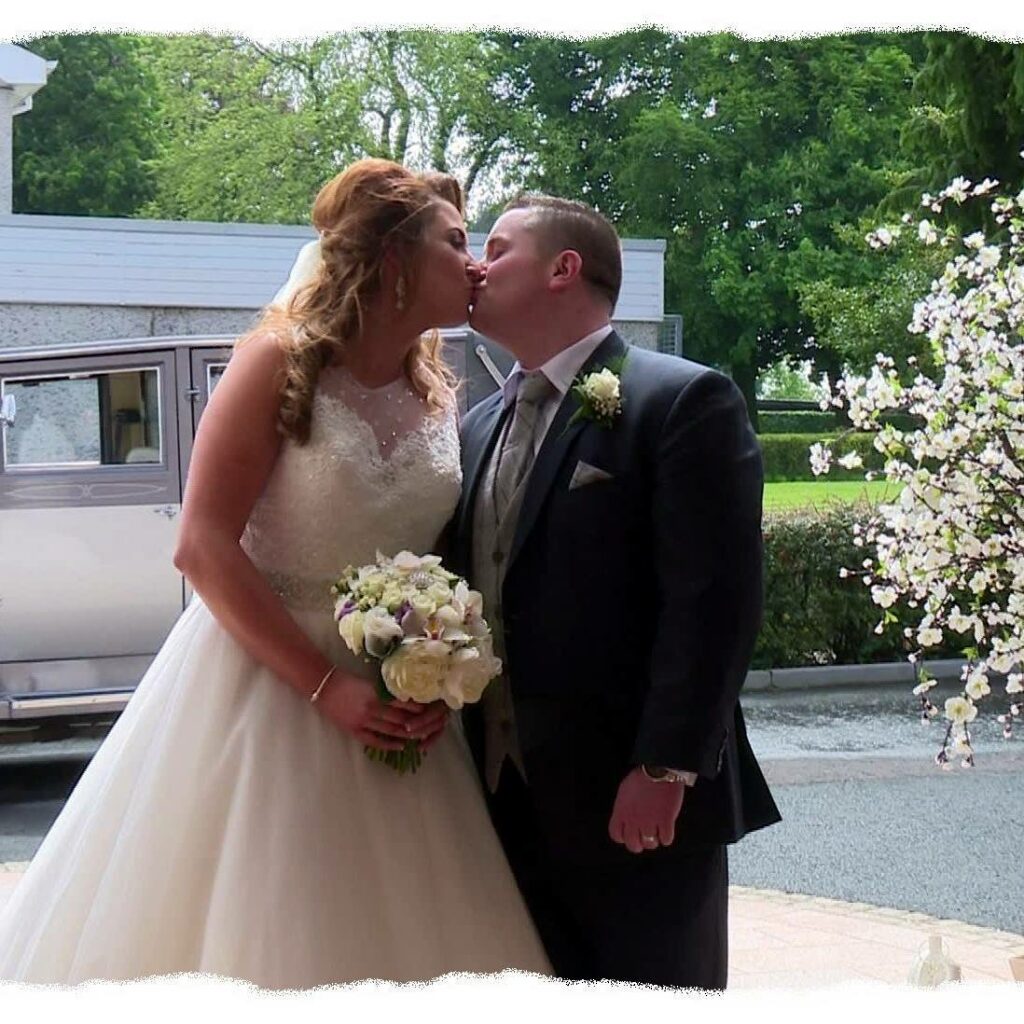 bride and groom kiss best wedding supplier County Antrim
