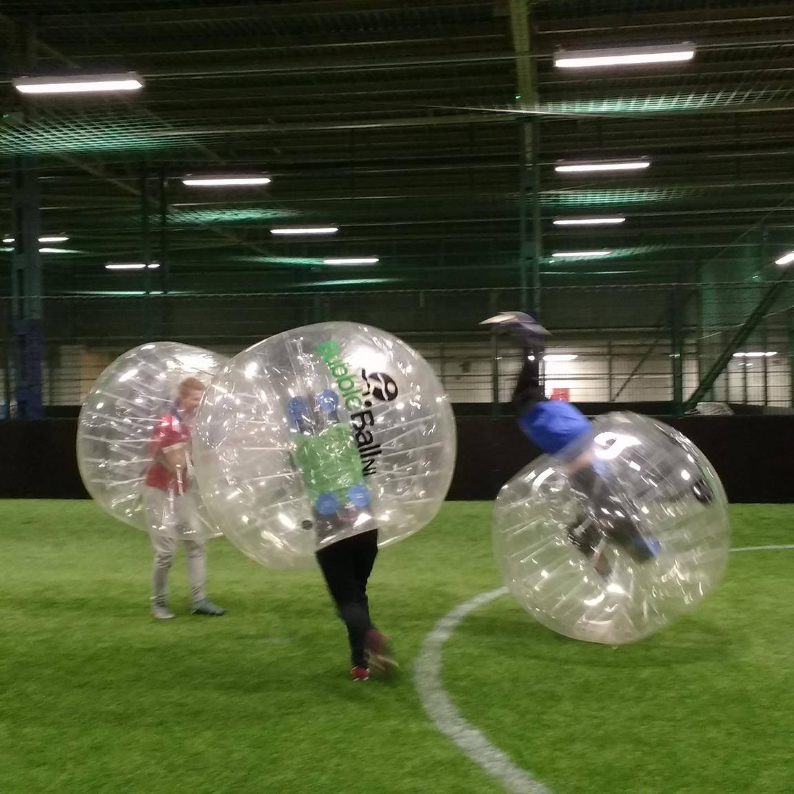 Man upside down in zorb while on a Stag do playing Bubble football in Belfast & Coleraine County Londonderry
