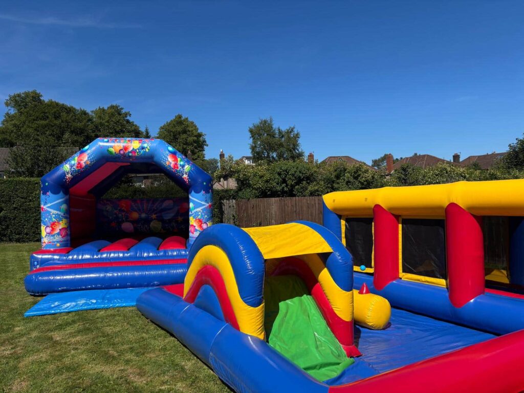 Kingdom Castles NI birthday party set up with colourful bright bouncy castles bouncy castle hire in ballymena Best party supplier Antrim BT41 for children's party